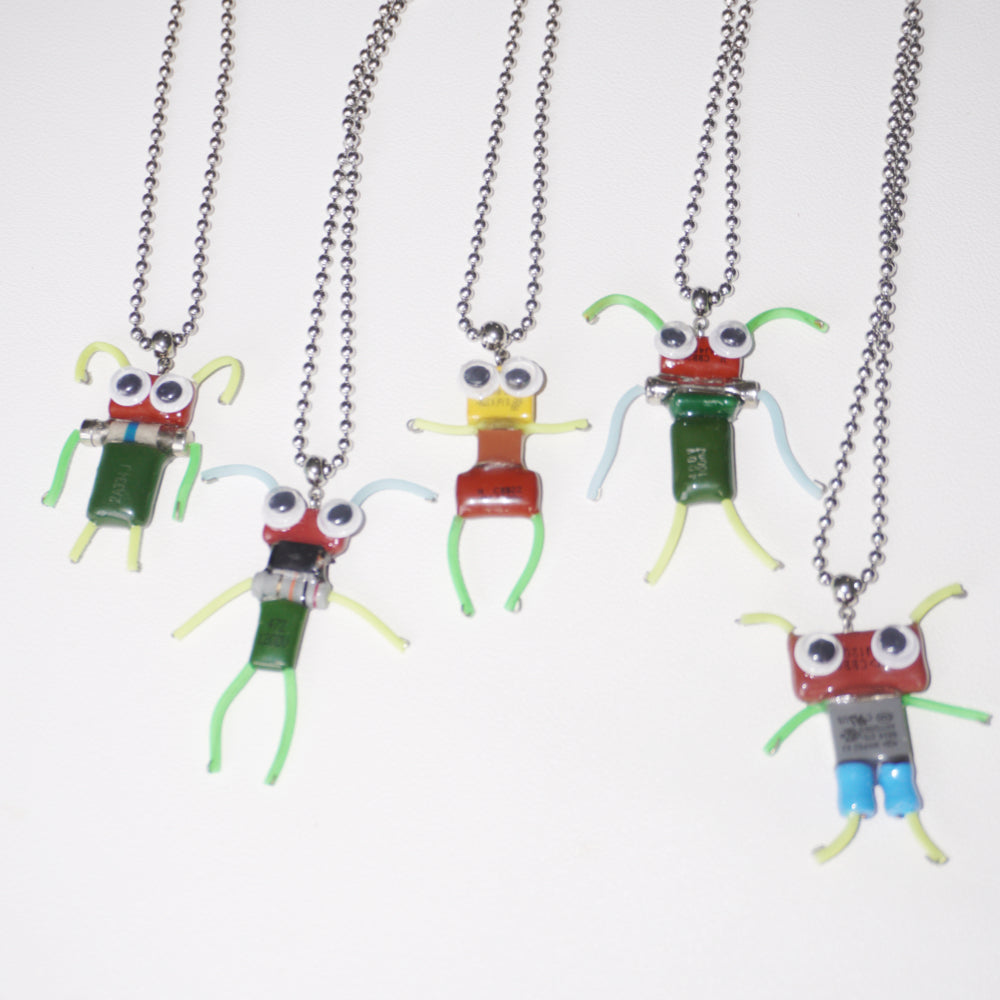 DZ010 Discarded electronic figurines with long necklaces Each one is unique