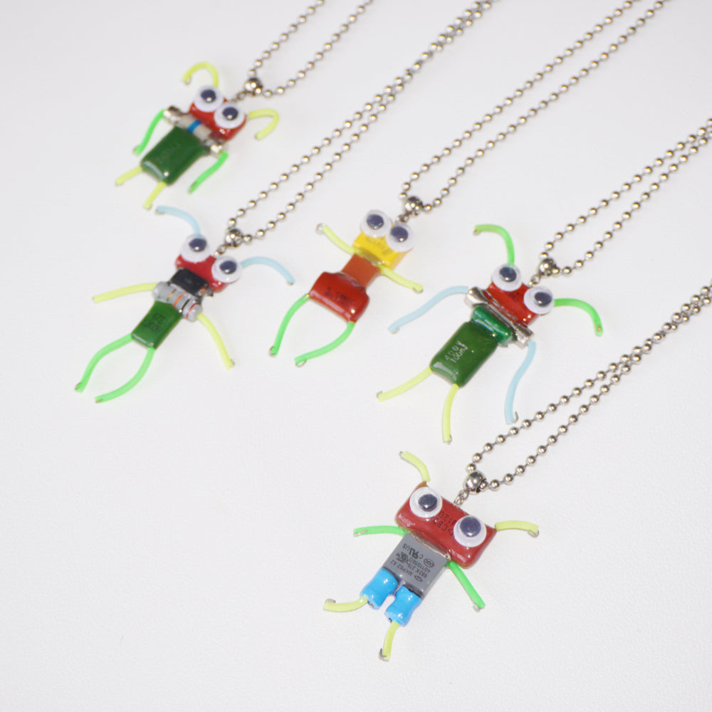 DZ010 Discarded electronic figurines with long necklaces Each one is unique