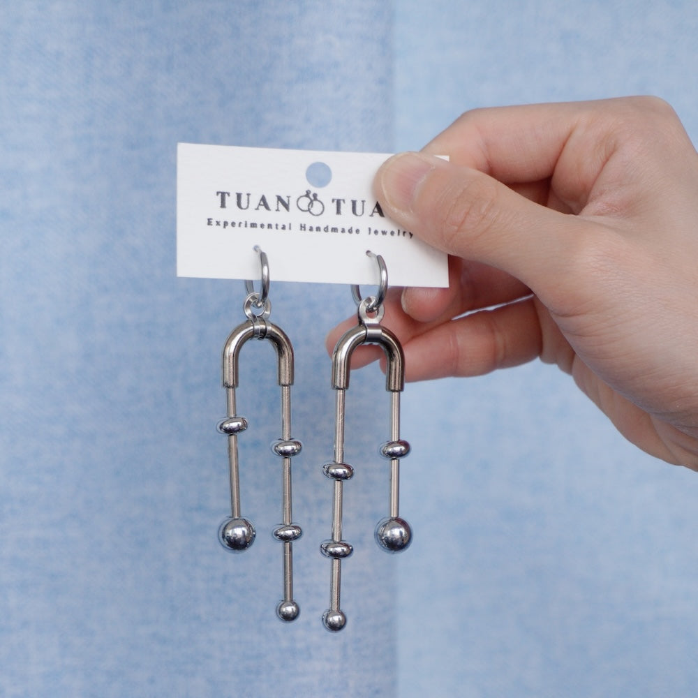 Industrial-style metal tassel earrings – U-shaped stainless steel drop statement earrings